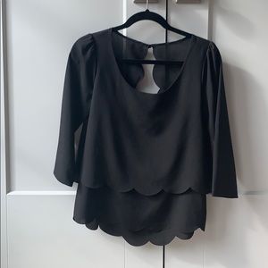 Black scalloped open back blouse